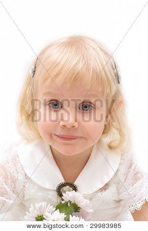 	Portrait of a little girl in a beautiful white dress