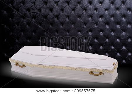 Closed Wooden White Coffin Isolated On Gray Luxury Background. Casket, Coffin On Royal Background.