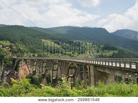 Concrete Arch Djurdjevica Tara Bridge Over The Tara River In Montenegro