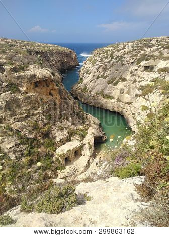 Wied Il-ghasri Lagoon Narrow Bay On Gozo Malta With Crystal Blue Turquoise Water