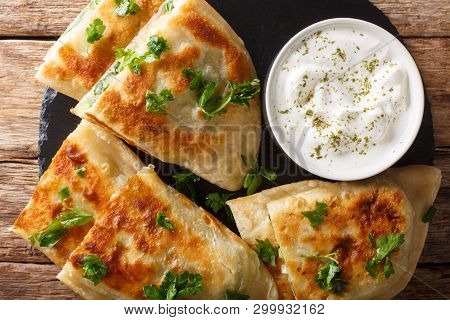 Bolani Is A Traditional Afghani Flatbread Stuffed And Baked With Either Potato, Onion, Cilantro Fill