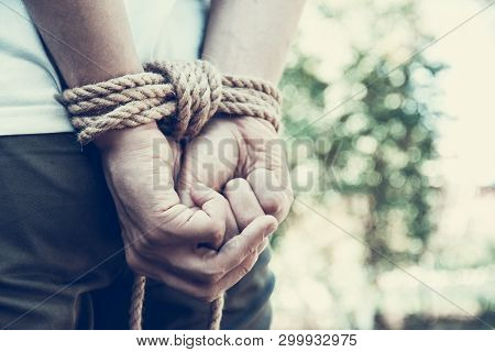 Man With Hands Tied. Hands Tied Up With Rope. Restraint Concept
