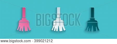 Paper Cut Feather Broom For Cleaning Icon Isolated On Blue Background. Feather Duster. Paper Art Sty