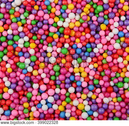 Abstract Background Texture Of Multicolor Expanded Polystyrene Balls, Close Up