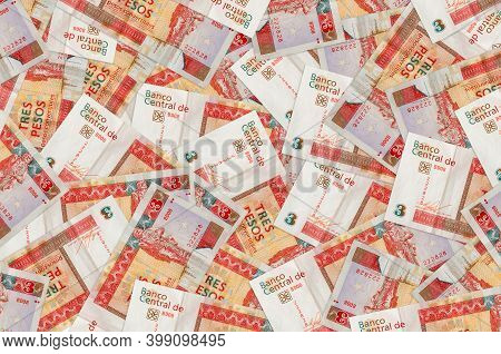 3 Cuban Pesos Convertibles Bills Lies In Big Pile. Rich Life Conceptual Background