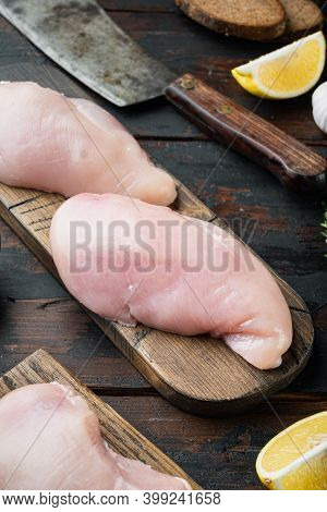 Crispy Garlicky Chicken Raw Ingredients On Dark Wooden Background