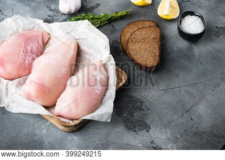 Crispy Garlicky Chicken Raw Ingredients On Grey Background With Copy Space