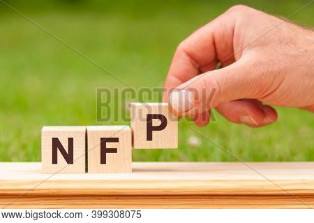 Acronym Nfp Written With Wooden Blocks, Concept