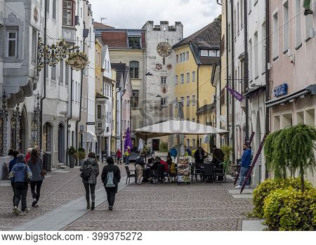 Bruneck, Italy - October 4, 2020: The City Of Bruneck With Terrace And Shopping People In Autumn.