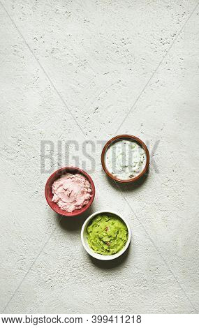 Bowls With Tarama, Tzatziki And Guacamole Sauce For Sandwich, Toast Or Crostini. Vegetarian Appetize