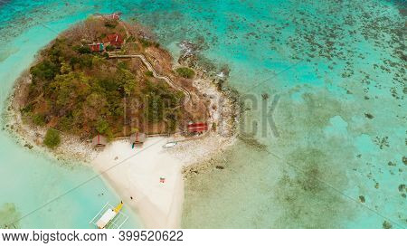 Aerial Seascape Tropical Island And Sand Beach, Turquoise Water And Coral Reef. Malacory Island, Phi