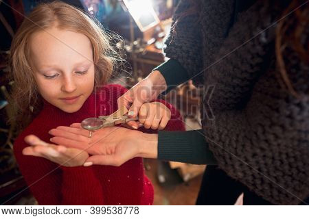 Prism. Cheerful Family, Mother And Kids Looking For Home Decoration And Holidays Gifts In Household 