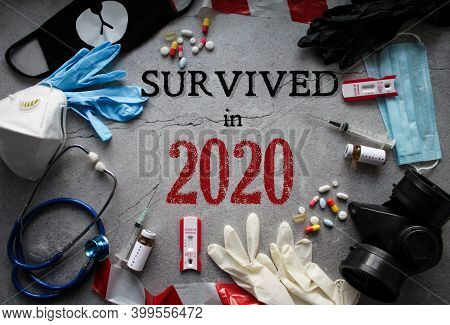 Survived In 2020. Symbols Of The Outgoing Year: Respirators And Masks, Pills And Vaccine, Coronaviru