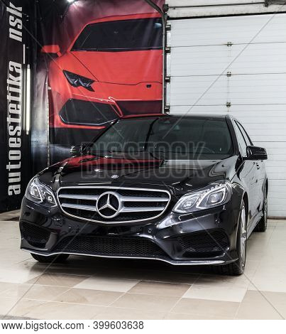 Novosibirsk, Russia - 11.30.2020: Close-up On A Car Mercedes E-class Body Standing Inthe Garage Box 