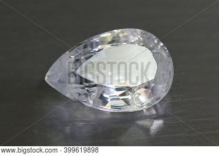 Natural White Sapphire On The Grey Background