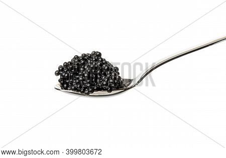 Fresh Grainy Black Paddlefish Caviar In Metal Spoon Isolated On White Background, Close Up