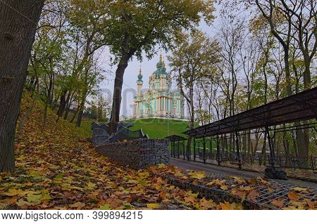 Majestic Autumn Colored Landscape View Of Famous Saint Andrew's Church On The Hill. Ancient Cathedra