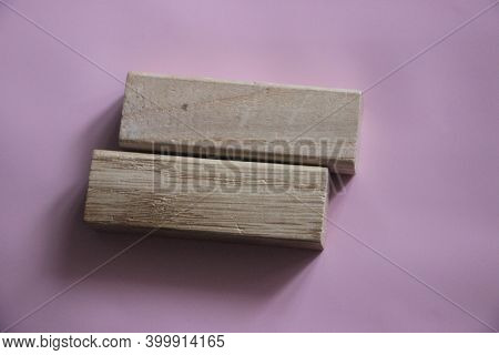 Two Wood Blocks Forming Equal Sign On Soft Pink And Lilac Background. Tolerance, Equality And Divers