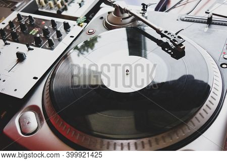 Dj Turntable Turntable Playing Vinyl Disc With Hip Hop Music.closeup, Focus On Needle Cartridge Head