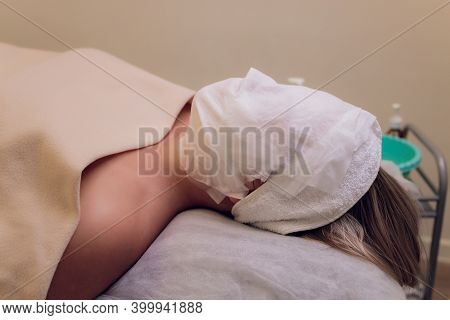 Beautiful Woman In The Spa Salon, Treatment Hyperpigmentation And Melasma On Face By Serum Mask, Fac