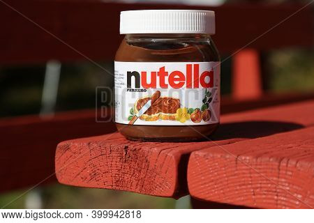 Bergen, Norway - July 22, 2020: Jar Of Nutella Chocolate Hazelnut Spread In An Outdoor Picnic Settin