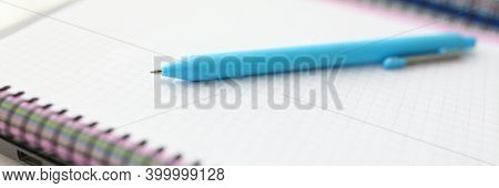 On Table Is Notebook And Blue Pen. Learning Professions Remotely Concept