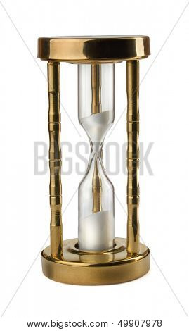 Old brass hour glass isolated on  white
