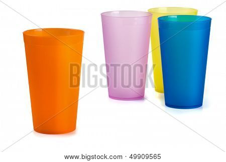 Four colorful plastic cups isolated on  white