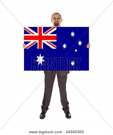 Smiling Businessman Holding A Big Card, Flag Of Australia