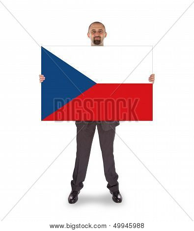 Smiling Businessman Holding A Big Card, Flag Of The Czech Republic