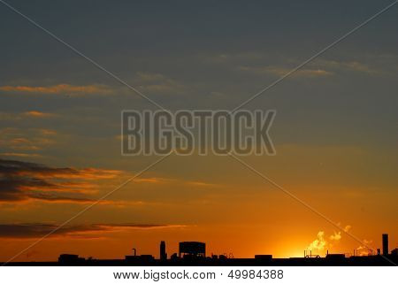 Orange Sunset And Roof Silhouette