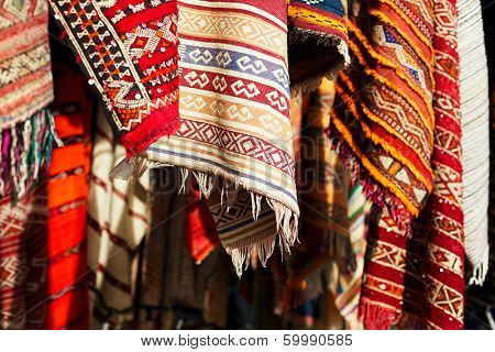 Moroccan Carpets in a street shop souk
