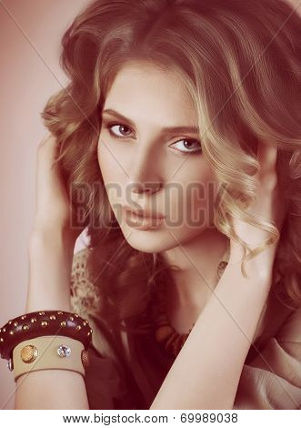 Fashion beautiful woman with jewelry precious decorations.