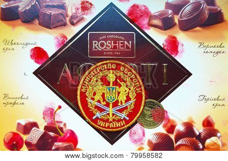 Illustrative editorial.Ukrainian Department of Defense chevron .With logo Roshen Inc. Trademark Roshen is property of ukrainian president Poroshenko. At January 10,2015 in Kiev, Ukraine 