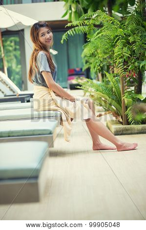 Beautiful Relex On Lounger Near Swimming Pool In Hotel, Krabi, Thailand