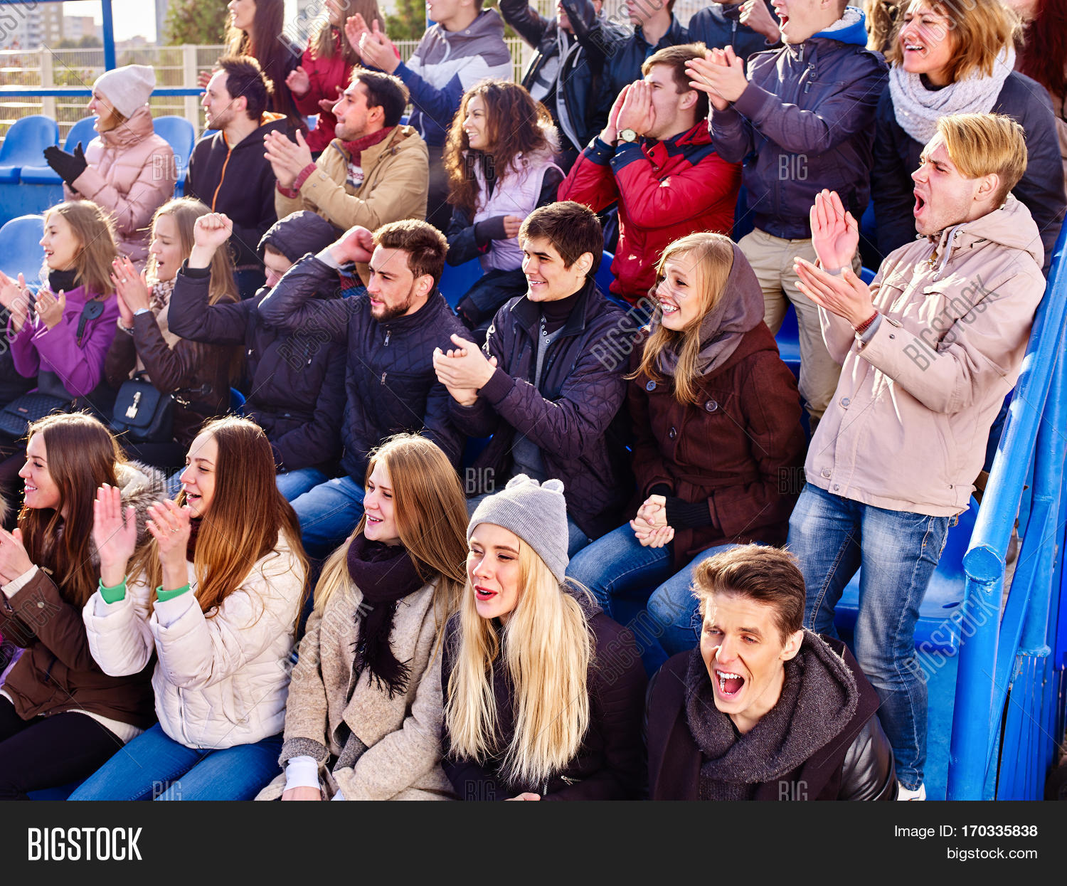 fans cheering in stadium people applaud your favorite team and