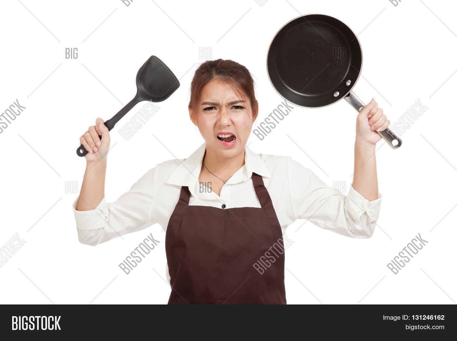 crazy asian girl cook with frying pan isolated on white back
