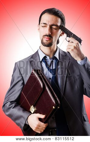 businessman committing suicide isolated on white
