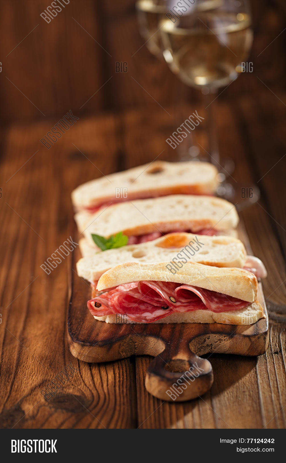 antipasti platter of cured meat, jamon, olives, sausage, salami