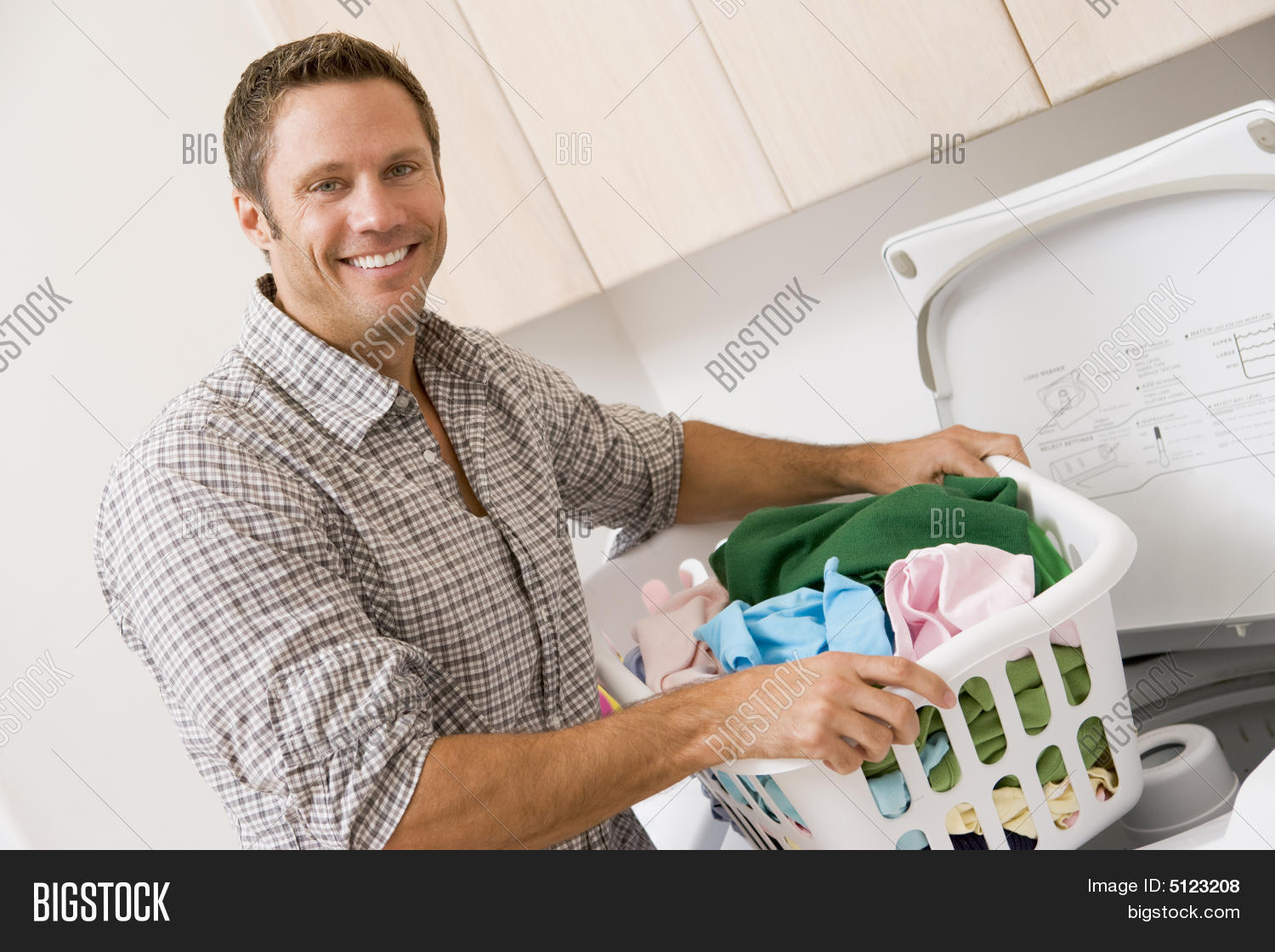 cheerful chores domestic happy man smiling washing 40s forties