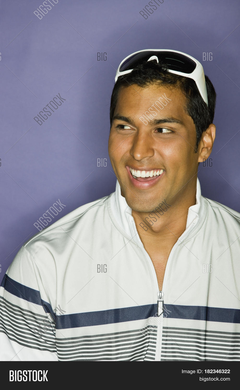 hispanic man laughing