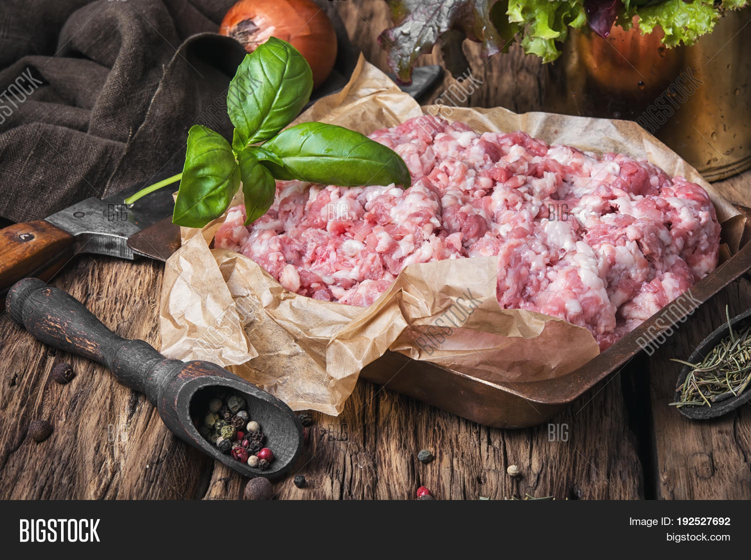 raw minced meat on vintage rustic background