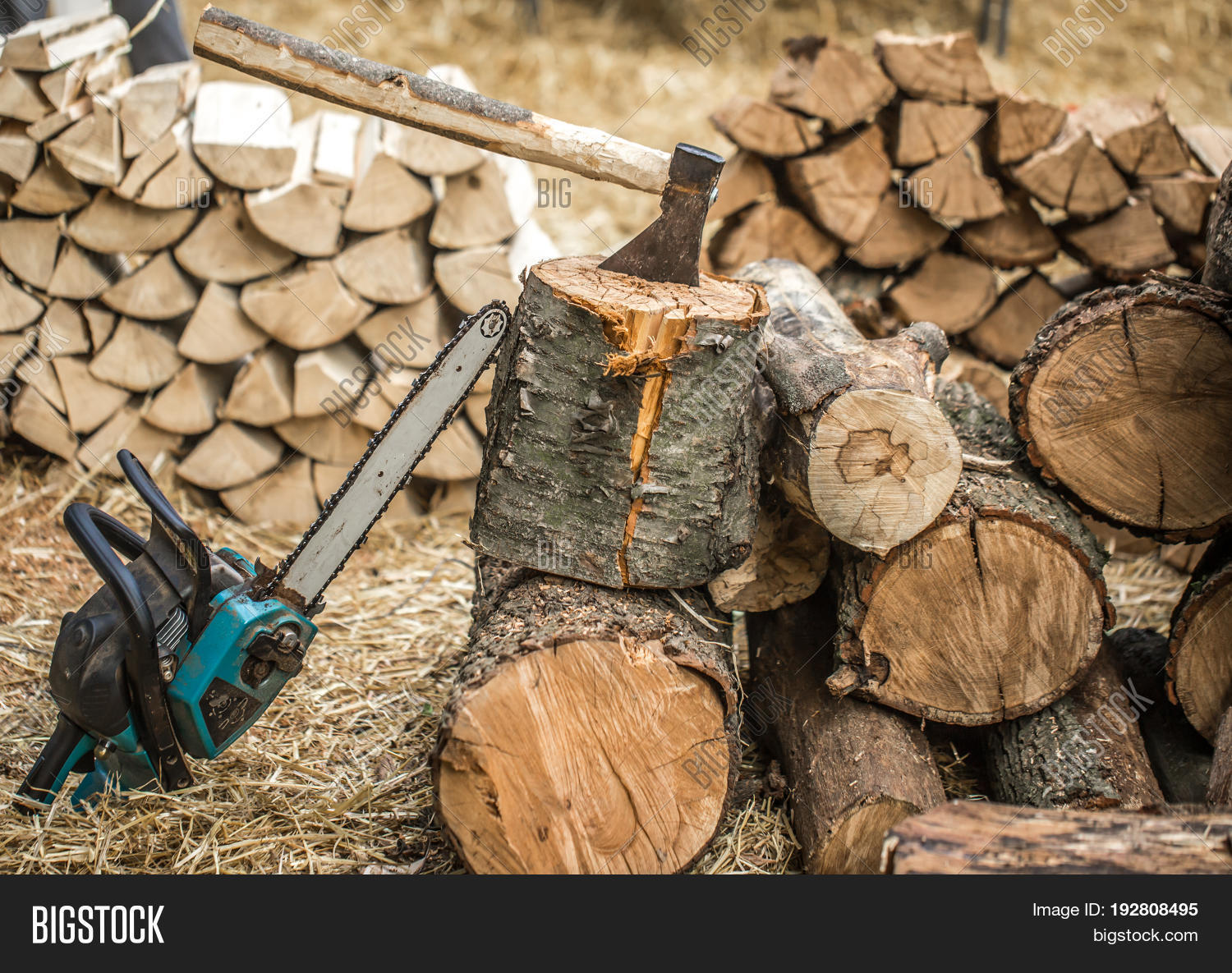 man chopping wood with a chainsaw close-up