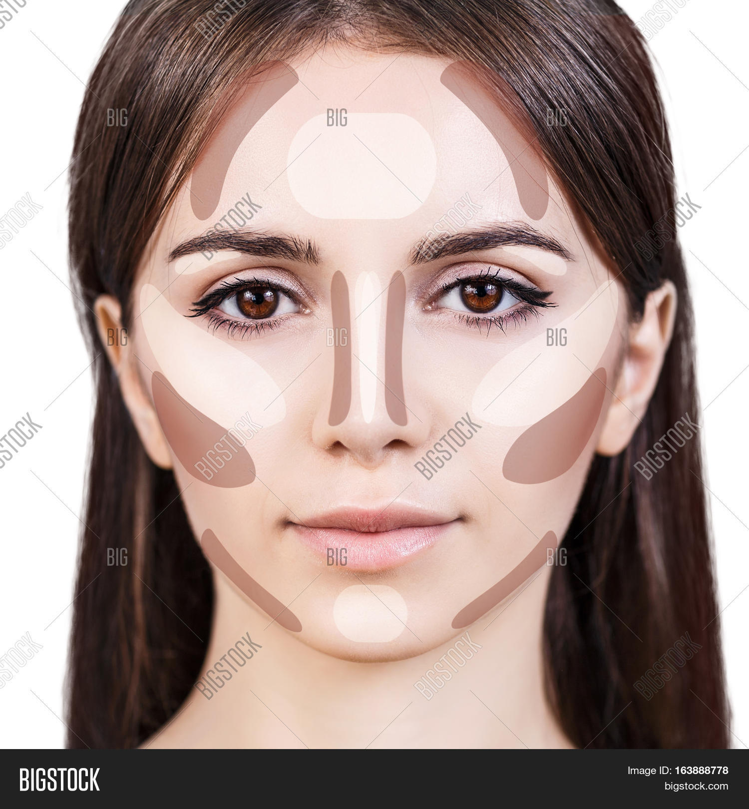 young womans face with contouring makeup.