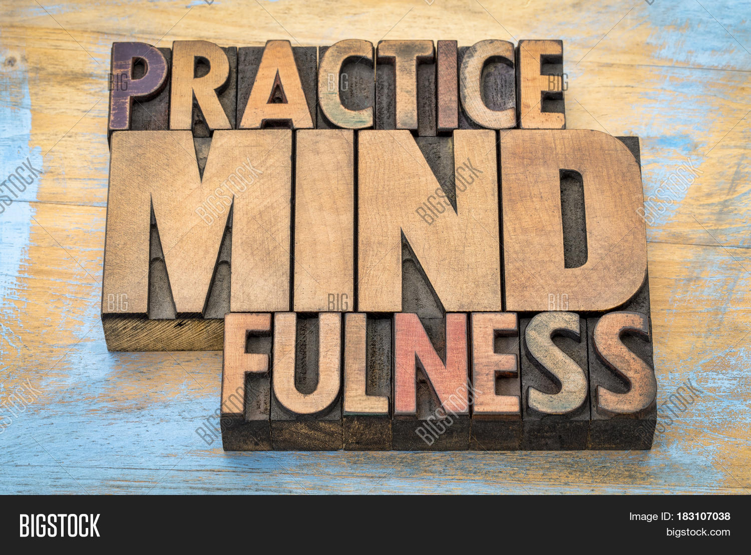 practice mindfulness - word abstract in vintage letterpress wood