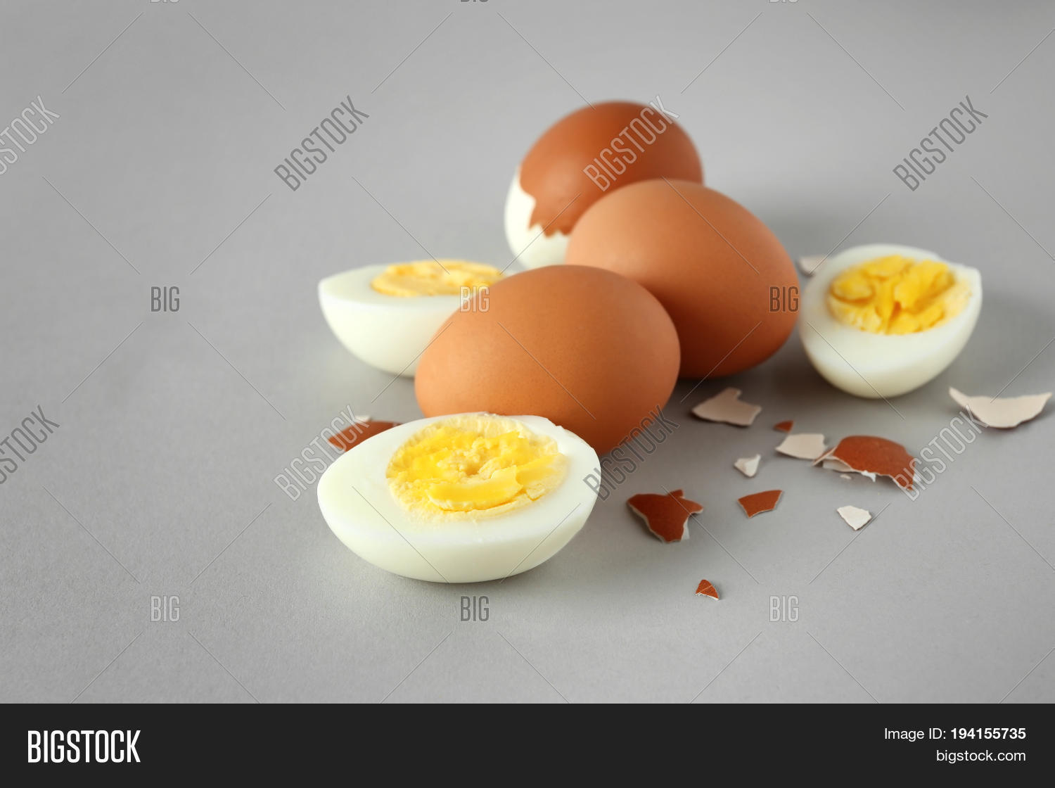 hard boiled eggs on grey background. nutrition concept