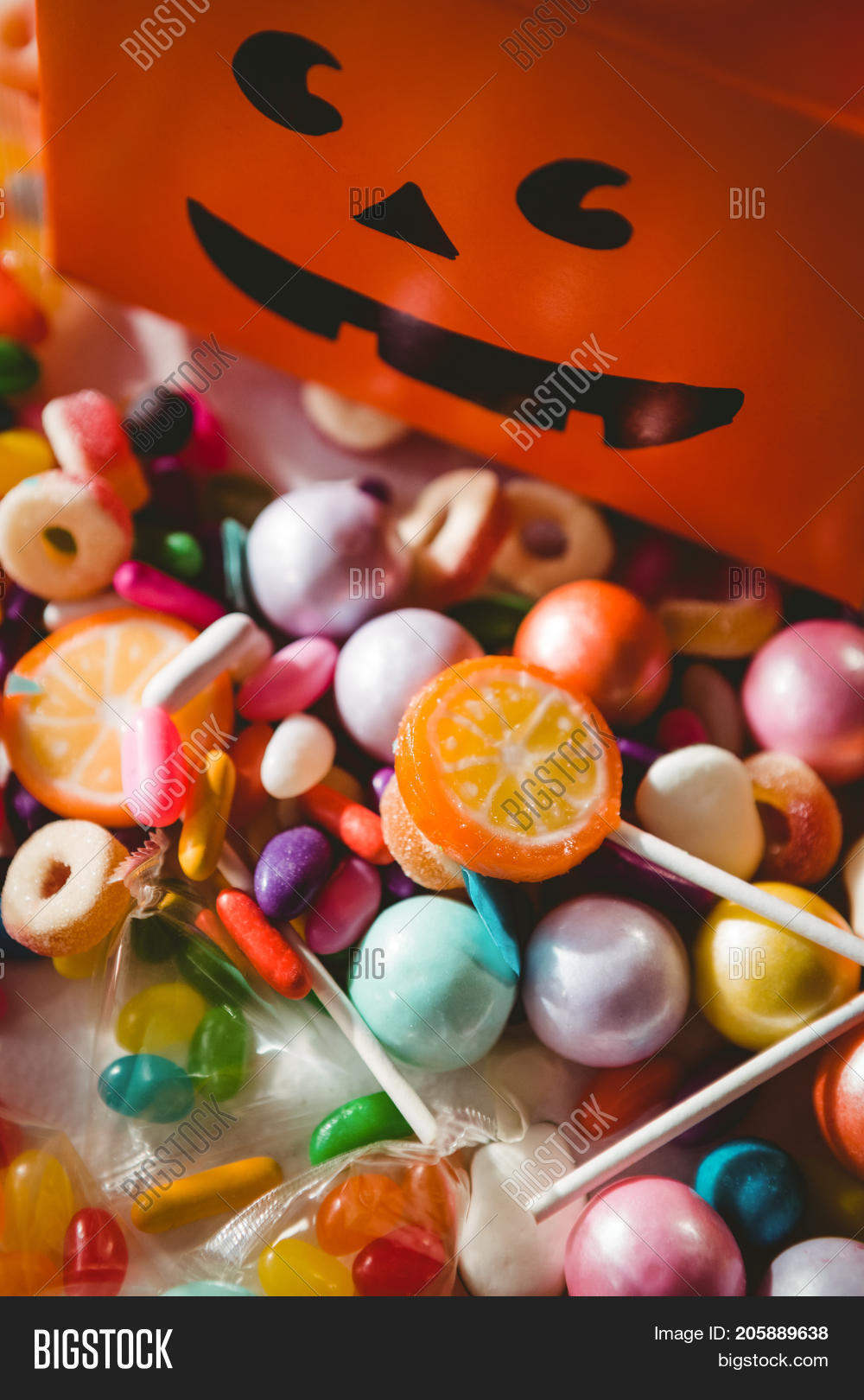 high angle view of various sweet food by orange box