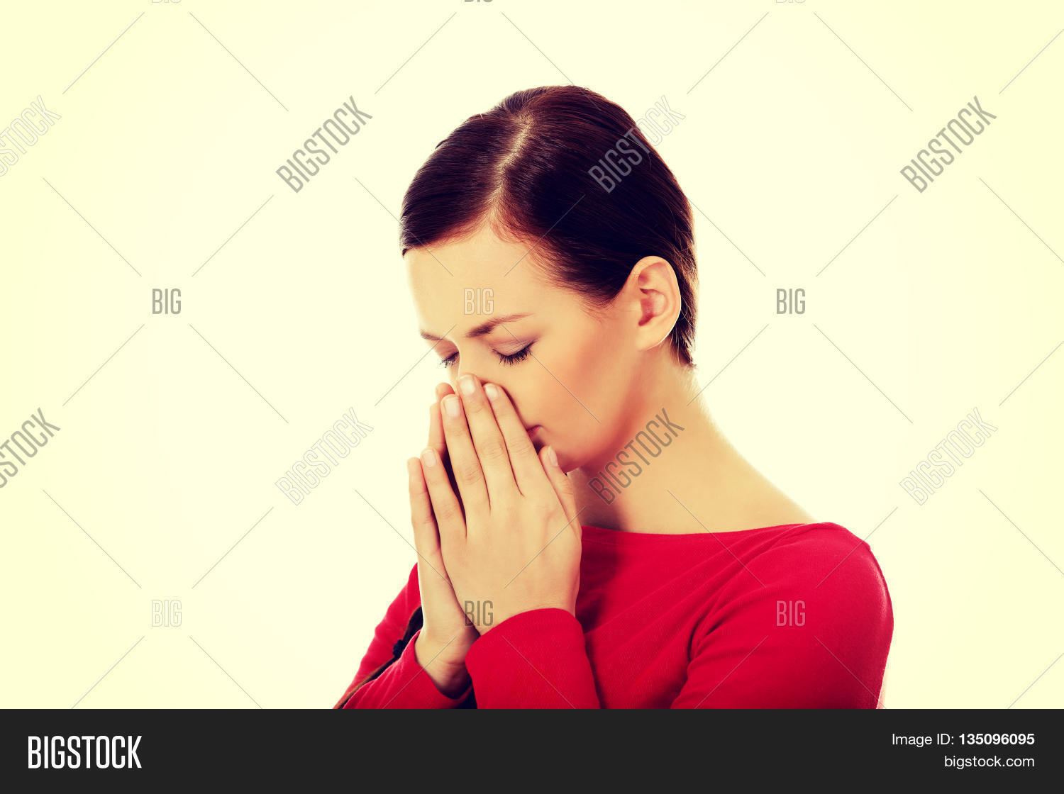 young sneezing woman with sinus pain