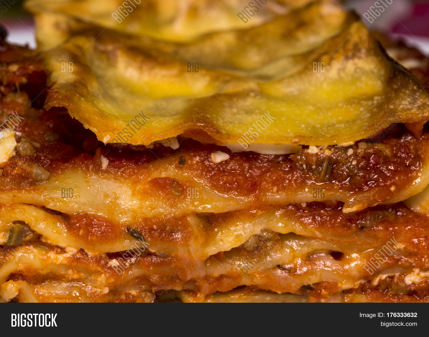 traditional italian lasagna with spicy tomato based ground beef