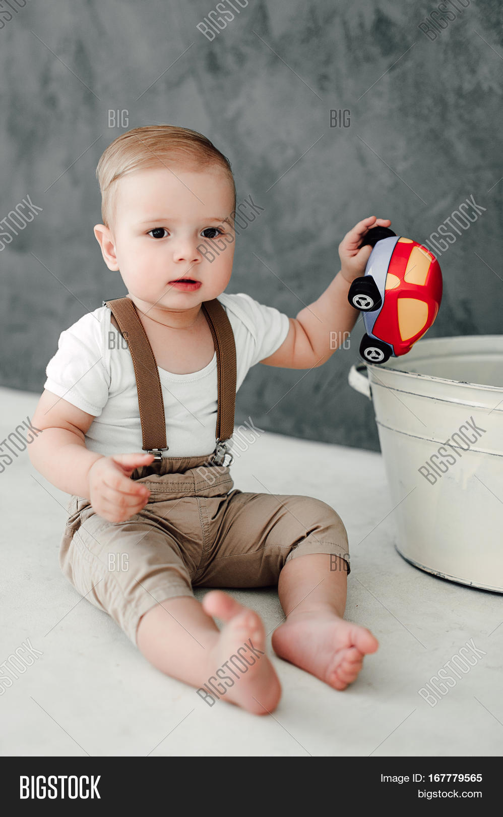 portrait of lovely little boy happy smiling celebrating 1 year